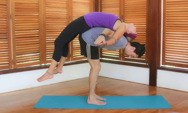 assisted backbend couples yoga poses